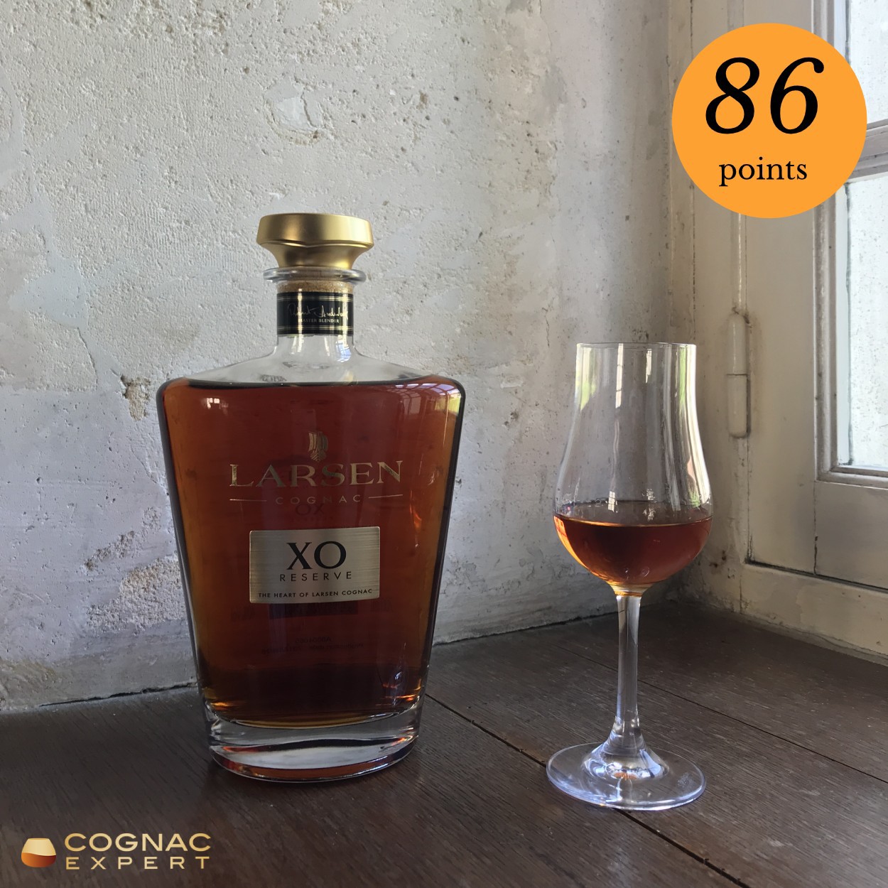Larsen XO Cognac bottle and glass