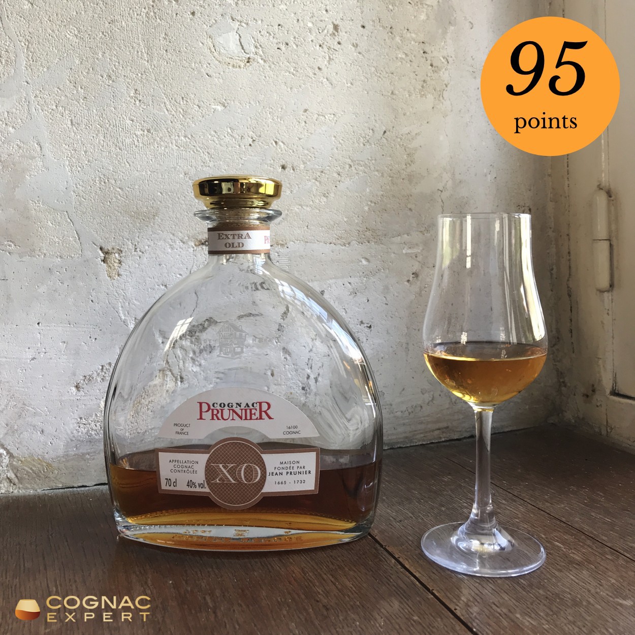 Prunier XO Cognac bottle and glass