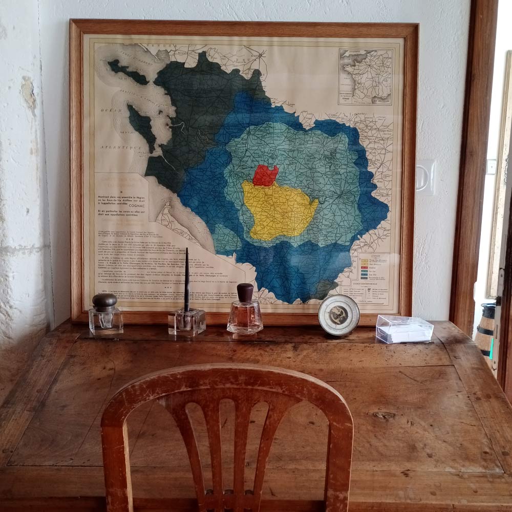 Office of cognac producer with map of crus